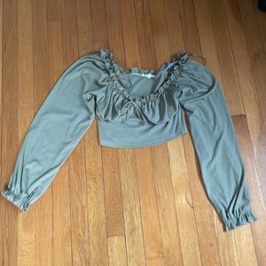 Going out top. In olive green